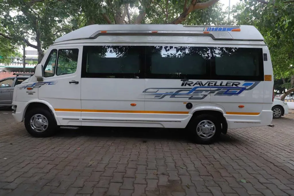 White 12 to 26 seater tempo traveller